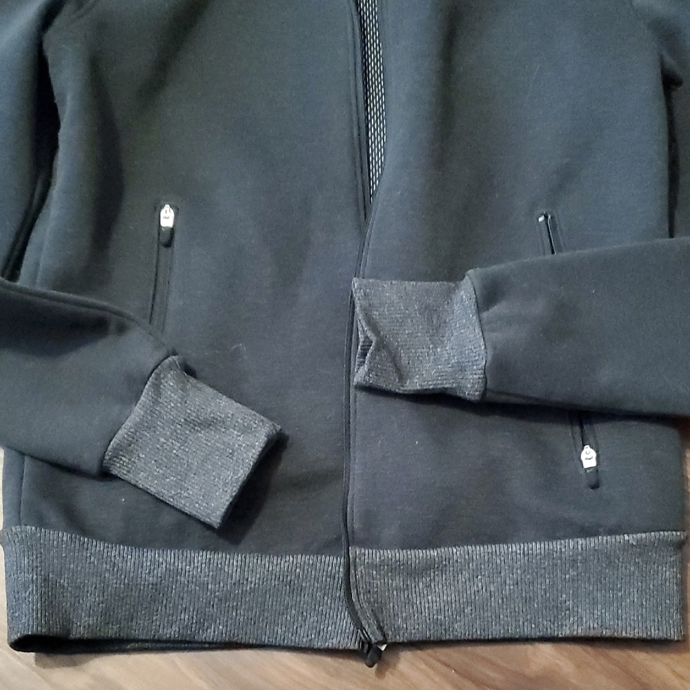 Nike Women's Dark Gray Golf Jacket with Swoosh Zippered Pockets - Picture 3 of 10